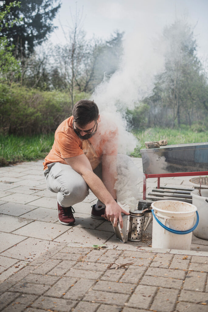 Poland, Warsaw, 20 April 2023

Fieldwork, education through practice. A 5th year veterinary student lights up a bee smoke machine.

In addition to laboratory classes, students of the Warsaw University of Life Sciences also participate in outdoor exercises, where they acquire practical beekeeping and care skills.

Tomasz Stabiński / NOOR